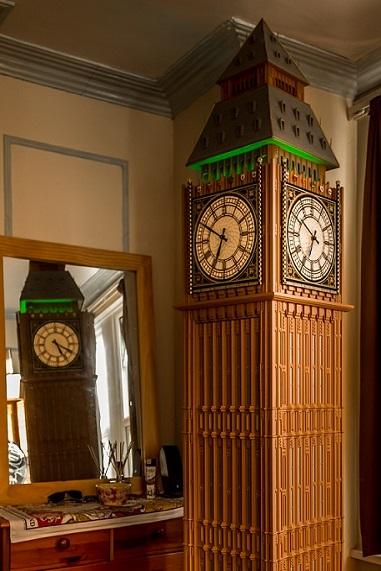 photo of WestminsterClock in the room, reflected in the mirror