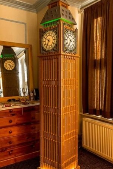 photo of WestminsterClock in room with closed door, to the side